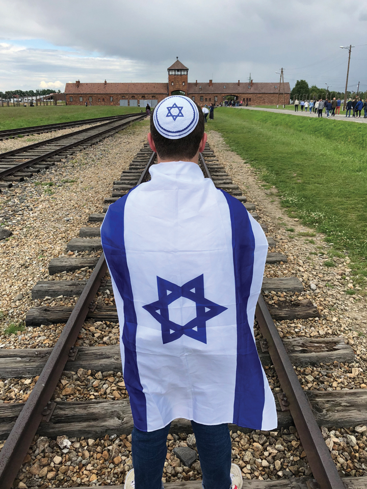 Ethan Fine participated in the USY Eastern Europe Israel Pilgrimage this summer. With the program, he visited four concentration camps in Poland. ‘We saw where many of our collective family members had been murdered not too long ago,’ Fine said.