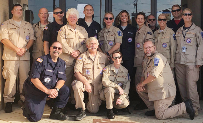 After Hurricane Michael ripped across Florida’s Panhandle in October, Dr. Allen Parmet (kneeling, second from left) and members of the Missouri Disaster Medical Assistance Team were sent to provide aid. Here they are at Calhoun Liberty Hospital in Blountstown, Florida.